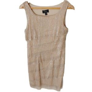 Sparkling gold cocktail dress with tiered layers